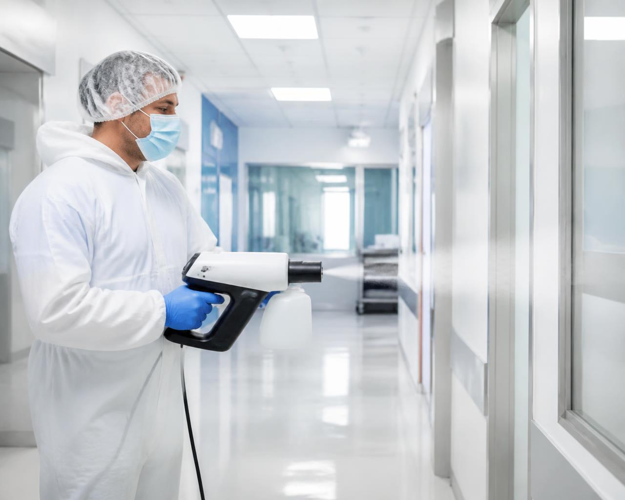 Professional specialist performing healthcare sanitation